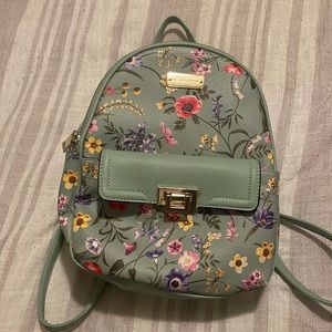 Floral faux leather backpack